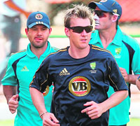 Australian captain Ricky Ponting (L) warms-up with teammates Brett Lee (C) and Michael Hussey during a training session in Jaipur on Wednesday. Ricky Ponting's Australia are looking for inside knowledge from former India coach Greg Chappell to help the tourists win the upcoming four-Test series on Indian soil. 