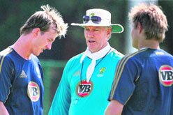 Australian assistant coach Greg Chappell with Brett Lee during a practice session at the RCA Future Academy. 