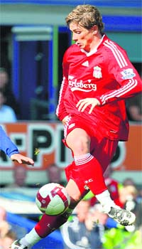 Fernando Torres controls the ball during their English Premier League match against Everton