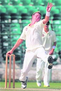 Australian pacer Brett Lee in action during the practice match against RCA Future Academy in Jaipur