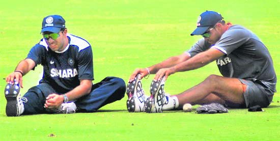 Board President�s XI captain Yuvraj Singh with a teammate at a practice session at Rajiv Gandhi International Cricket Stadium in Hyderabad on Wednesday. � PTI