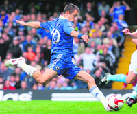 Chelsea�s Joe Cole scores the opening goal against Aston Villa at Stamford Bridge stadium on Sunday. 