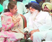 Union minister for tourism Ambika Soni discusses a point with Chief Minister Parkash Singh Badal after the inauguration of a tourist complex near Attari check post on Tuesday.