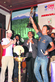 Padam holds aloft the 4th Hercules MTB Himachal Championship trophy at the concluding function in Manali on Monday. 
