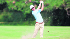 Liang Wen-Chong drives the ball on the tenth hole during the third round of the Indian Open at the Delhi Golf Club in New Delhi on Saturday.