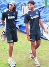 Ishant Sharma (L) and Munaf Patel during a practice session at PCA Stadium in Mohali on Thursday.