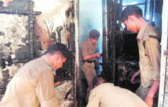 File photo of a fireman dousing flames. 