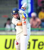 V. V. S. Laxman plays a shot during the first day of the third Test between India and Australia at Ferozeshah Kotla Stadium in New Delhi on Wednesday. 