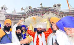 300-year-old handwritten Bir is being taken into the sanctum sanctorum 