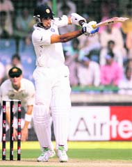 VVS Laxman plays a shot on the second day of the third Test match against Australia in New Delhi