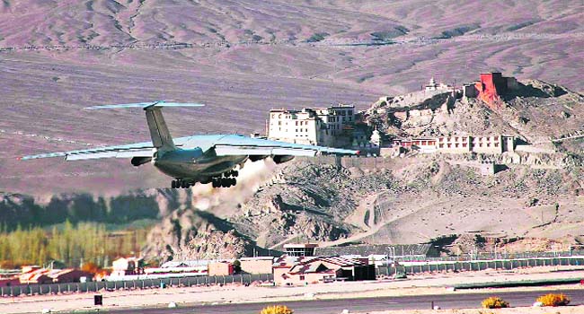An IAF transport aircraft takes off from the country�s highest- altitude airport