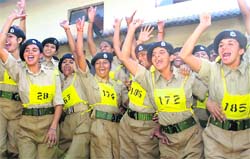Women recruits of the first batch of 200 BSF constables in a cheerful mood at the inauguration of their training at Kharka Camp, near Hoshiarpu