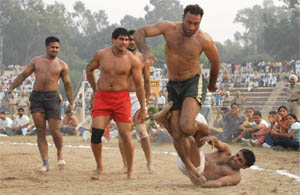 Wrestlers in Action: The fourth match of the Indo-Pak Kabaddi series in progress at Muktsar on Wednesday.