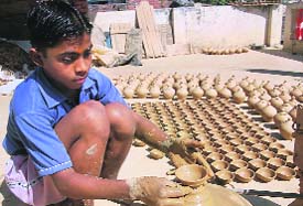 Child labour is banned, but in the absence of strict enforcement of law, many young lives continue to toil in various jobs to eke out a living as is evident from these pictures clicked by Tribune lensman Anil P. Rawat