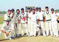 Jubilant Haryana team after defeating Goa in the Ranji Trophy match at Rohtak.