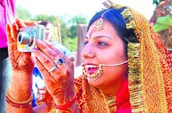 A woman tries her hand at photography in Dehradun. 