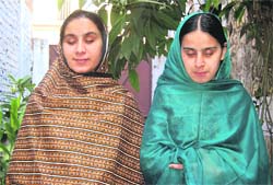CONFIDENT DUO: Sisters Sualaiheen and Aarfeen A Tribune photograph