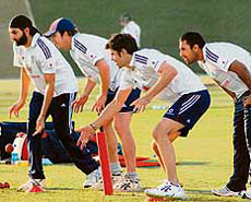 England's Monty Panesar, Alan Richardson, James Andersen and Ravi Bopara train at the Zayed cricket stadium in Abu Dhabi on Saturday before flying to India for the two-Test series.