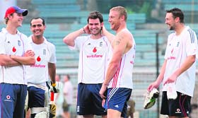 England cricketer Andrew Flintoff (2-R) jokes with teammates Stuart Broad (L), Owais Shah (2-L), James Anderson (3-R) and Stephen Harmison (R) during a training session at the M.A. Chidambaram stadium in Chennai