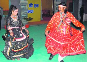 Rajasdthani dancers perform at a trade fair in Dehradun