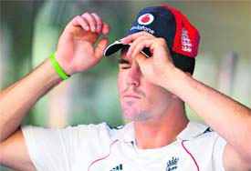 England captain Kevin Pietersen adjusts his hat as he waits for the presentation ceremony.