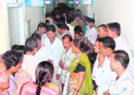 Patients line up at the Doon Hospital in Dehradun