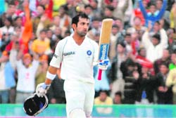Gautam Gambhir celebrates his century at Mohali on Friday. 