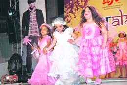 School kids walk the ramp at a fashion show  organised by the International Institute of Fashion Technology, Dehradun