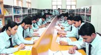 Students at the Uttarakhand Institute of Technology library.