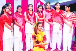 Students of Adarsh Public School recite hymn at a cultural function.