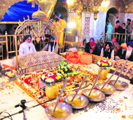 A view in the sanctum sanctorum of the Golden Temple on the birth anniversary of Guru Gobind Singh on Monday.