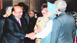 Ashok Pal being felicitated by Prime Minister Manmohan Singh in New Delhi