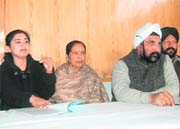 Family members of Captain Jaspreet Chawla address mediapersons in Dehradun.