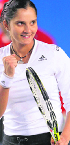 Sania Mirza celebrates after beating Hungary�s Agnes Szavay in Hong Kong on Friday.