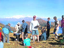 Australian students have food at Kauri Pass in Chamoli district during their visit