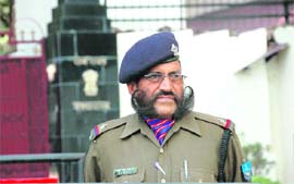 A policeman with a long moustache posted outside the Uttarakhand Raj Bhawan in Dehradun.