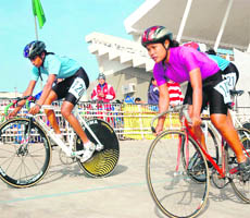 Cyclists participate in the 62nd Senior, 39th Junior and 25th Sub-Junior National Track Cycling Championships at Punjabi University in Patiala, on Thursday. 