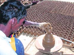 A potter makes earthen cups in Dehradun. Tribune photo: