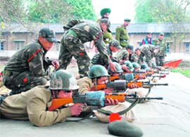 NCC cadets practice at a firing range on the outskirts of Dehradun.