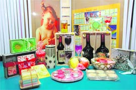 A variety of candles on display at a store in Dehradun.