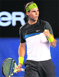 Rafael Nadal gestures after victory in his men�s singles match against Christophe Rochus on Tuesday. Nadal won 6-0, 6-2, 6-2.