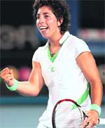 Carla Suarez Navarro celebrates defeating Venus Williams . Navarro won 2-6, 6-3, 7-5