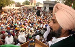 Congress general secretary Raninder Singh addressing party workers at Ballianwali village in Bathinda on Sunday. 