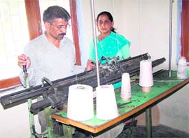 Volunteers knit Angora sweaters