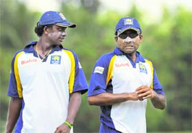 Ajantha Mendis (L) and Mahela Jayawardene