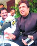 Bollywood actor and Congress MP from Mumbai Govinda interacts with the media