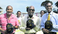 West Indies' cricket legends (from left) Andy Roberts, Sir Vivian Richards and Michael Holding pose for a picture after they were presented with their ICC�s Hall of Fame caps