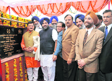 Deputy Chief Minister Sukhbir Singh Badal (second from left) lays the foundation stone of air-conditioned bus stand at Patiala on Wednesday.