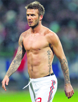 AC Milan's David Beckham leaves the field after the UEFA Cup match against Werder Bremen in Bremen