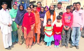 Members of Hindu families from Pakistan in Amritsar on Wednesday. 